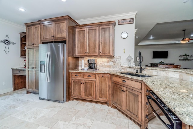 7601 Continental Pkwy, Amarillo, TX 79119 - kitchen with stainless steel fridge with ice dispenser, dishwasher, ceiling fan, light stone counters, and ornamental molding