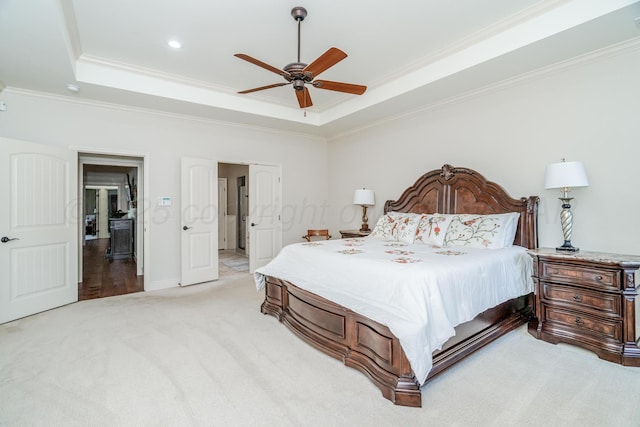 7601 Continental Pkwy, Amarillo, TX 79119 - bedroom featuring a raised ceiling, light carpet, ornamental molding, ceiling fan, and recessed lighting