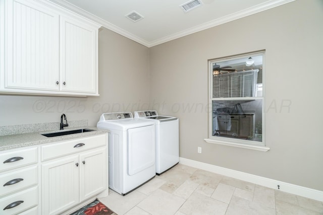 7601 Continental Pkwy, Amarillo, TX 79119 - laundry area featuring ornamental molding, separate washer and dryer, cabinet space, and a ceiling fan