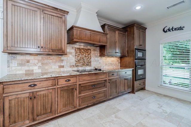 7601 Continental Pkwy, Amarillo, TX 79119 - kitchen featuring custom exhaust hood, black appliances, crown molding, light stone counters, and decorative backsplash