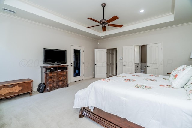 7601 Continental Pkwy, Amarillo, TX 79119 - carpeted bedroom with a tray ceiling, ornamental molding, recessed lighting, and a ceiling fan