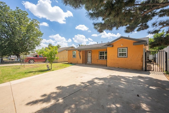 exterior space featuring a front lawn