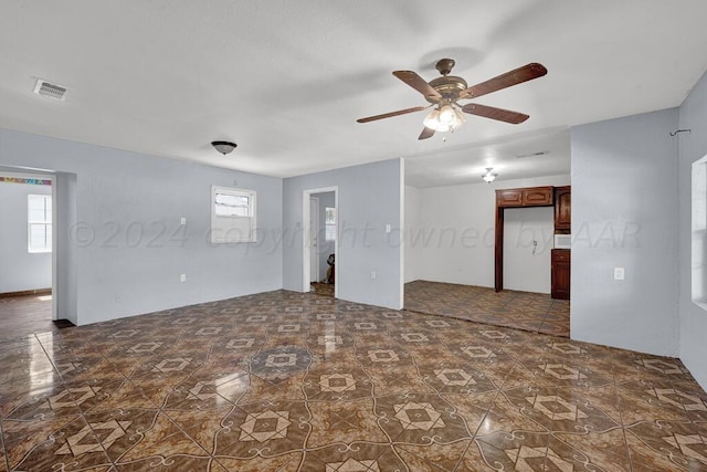 empty room featuring ceiling fan