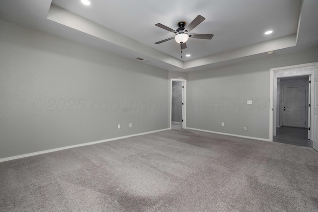 7703 Fresno Dr, Amarillo, TX 79118 - carpeted spare room with a raised ceiling, baseboards, a ceiling fan, and recessed lighting