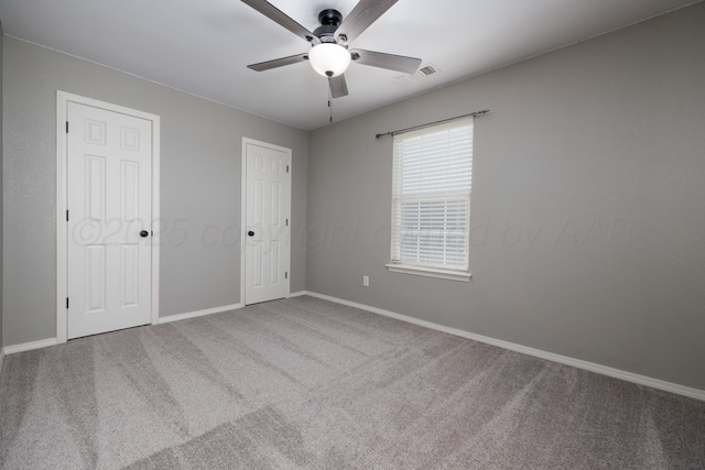 7703 Fresno Dr, Amarillo, TX 79118 - unfurnished bedroom with carpet floors, baseboards, and a ceiling fan