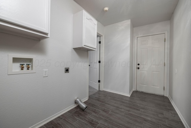 7703 Fresno Dr, Amarillo, TX 79118 - clothes washing area featuring cabinet space, hookup for an electric dryer, dark wood-style floors, and baseboards