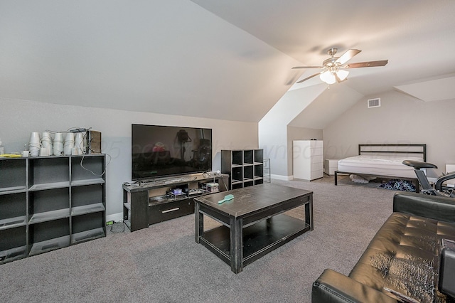 carpeted living room featuring vaulted ceiling and ceiling fan