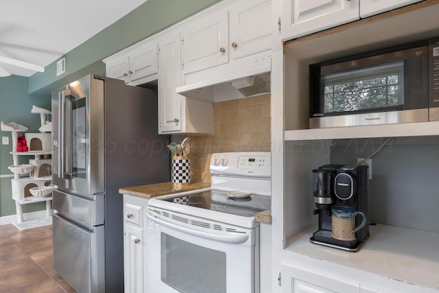 3101 SW 28th Ave, Amarillo, TX 79109 - kitchen with stainless steel appliances, visible vents, under cabinet range hood, decorative backsplash, and white cabinets