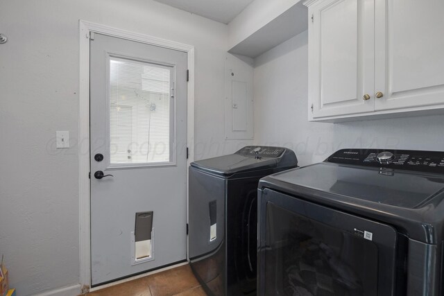 3101 SW 28th Ave, Amarillo, TX 79109 - laundry room featuring washer and dryer, cabinet space, and tile patterned flooring