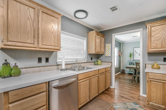 1228 S Osborne St, Pampa, TX 79065 - kitchen with dishwasher, a sink, light wood-style floors, light countertops, and ornamental molding