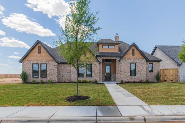 9504 Stonecrest Dr, Amarillo, TX 79118 - craftsman house with brick siding, a chimney, a shingled roof, and a gate
