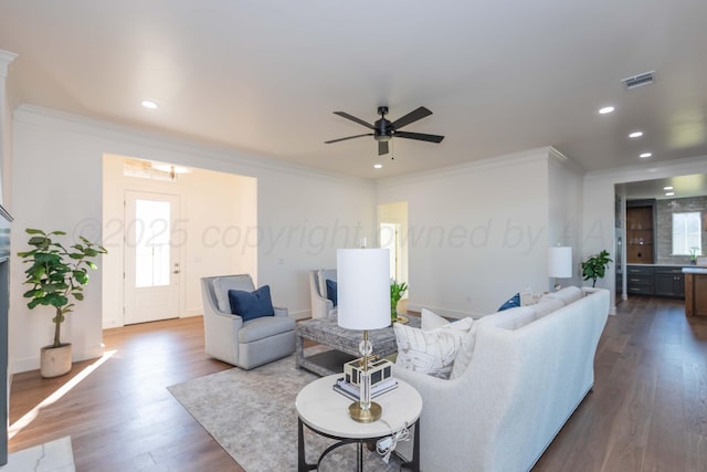 9504 Stonecrest Dr, Amarillo, TX 79118 - living area with crown molding, wood finished floors, a ceiling fan, plenty of natural light, and recessed lighting