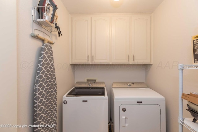6810 Montague Dr, Amarillo, TX 79109 - laundry area featuring independent washer and dryer and cabinet space