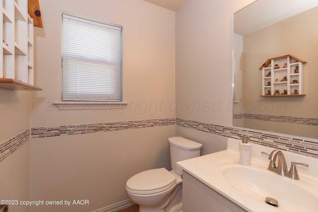 6810 Montague Dr, Amarillo, TX 79109 - bathroom with tile walls, vanity, and wainscoting