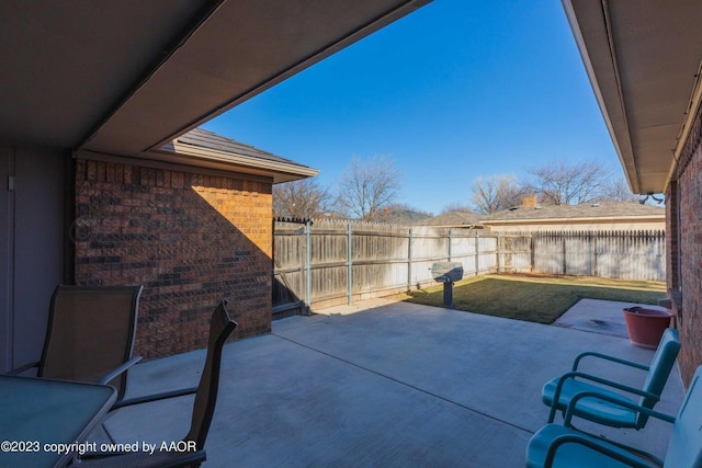 6810 Montague Dr, Amarillo, TX 79109 - fenced backyard featuring a patio