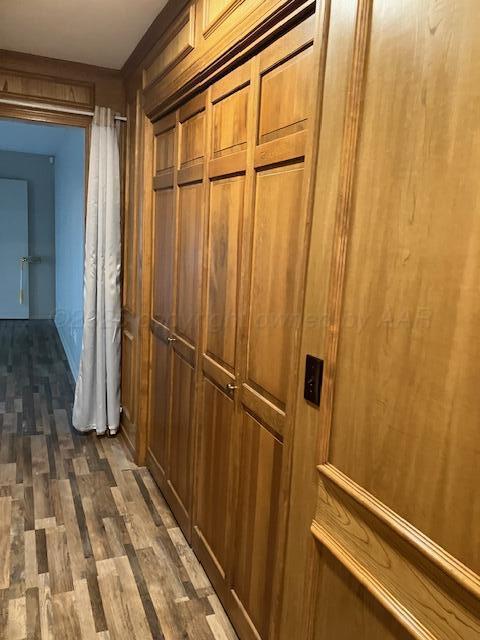6810 Montague Dr, Amarillo, TX 79109 - hall featuring dark wood-style flooring
