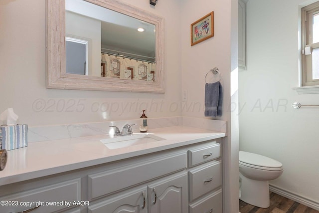 6810 Montague Dr, Amarillo, TX 79109 - full bath featuring vanity and wood finished floors