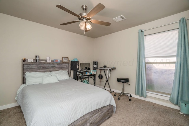 carpeted bedroom featuring ceiling fan