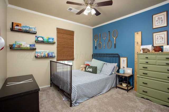 bedroom featuring crown molding, a ceiling fan, visible vents, and carpet