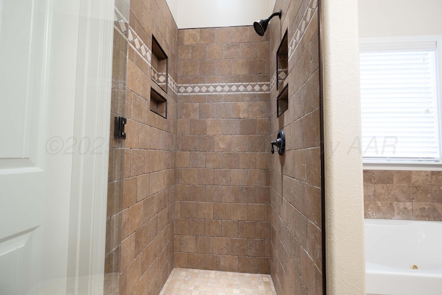 8603 Garden Way Dr, Amarillo, TX 79119 - bathroom featuring a shower stall and a tub with jets