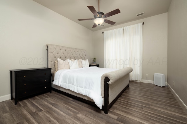 8603 Garden Way Dr, Amarillo, TX 79119 - bedroom with dark wood-style floors, baseboards, and ceiling fan