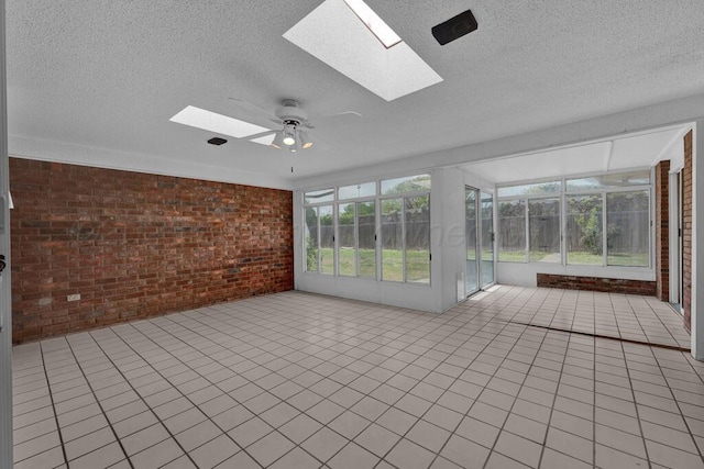 145 N Kingwood St, Hereford, TX 79045 - unfurnished sunroom featuring a skylight