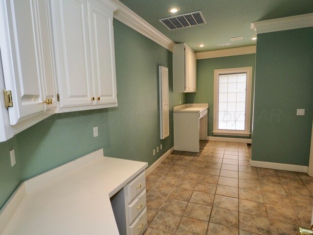 5105 Olsen Cir, Amarillo, TX 79106 - kitchen featuring crown molding, white cabinets, light countertops, and recessed lighting