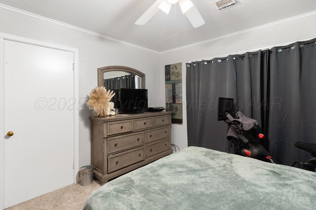 2209 N Beech Ln, Pampa, TX 79065 - bedroom featuring carpet, crown molding, and a ceiling fan
