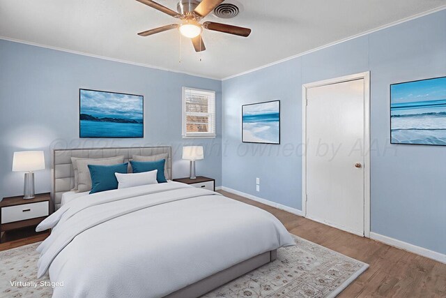 2209 N Beech Ln, Pampa, TX 79065 - bedroom with wood finished floors, baseboards, ornamental molding, and ceiling fan