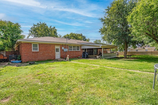 2209 N Beech Ln, Pampa, TX 79065 - rear view of property featuring central air condition unit and brick siding