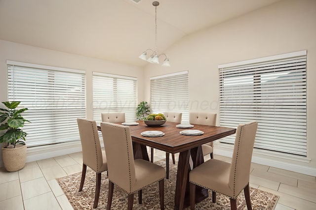 7308 Sinclair St, Amarillo, TX 79119 - dining space featuring vaulted ceiling, a chandelier, and light tile patterned flooring