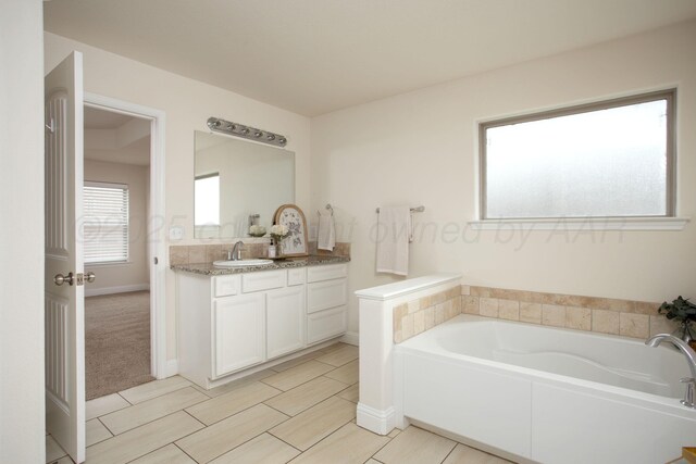 7308 Sinclair St, Amarillo, TX 79119 - bathroom with vanity and a bath