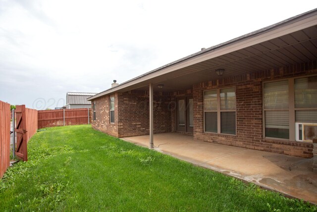 7308 Sinclair St, Amarillo, TX 79119 - fenced backyard featuring a patio