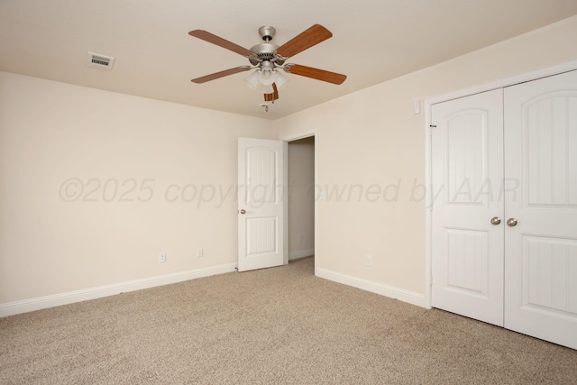 7308 Sinclair St, Amarillo, TX 79119 - unfurnished bedroom with carpet, a closet, and a ceiling fan