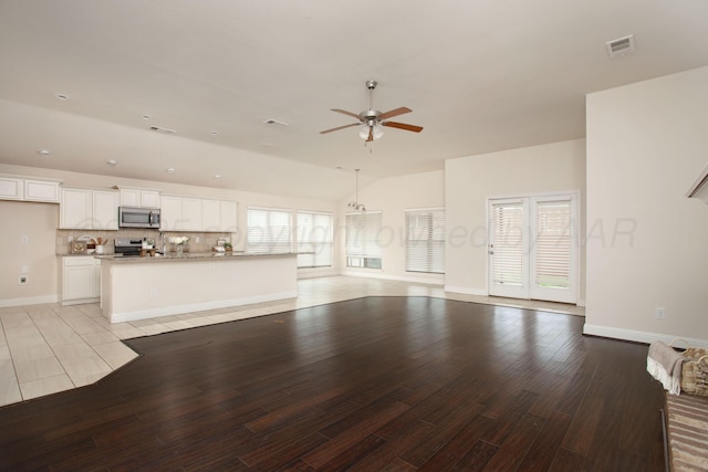 7308 Sinclair St, Amarillo, TX 79119 - unfurnished living room with ceiling fan and light wood-type flooring