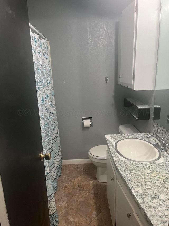 605 Star St, Hereford, TX 79045 - bathroom featuring vanity and a shower with curtain