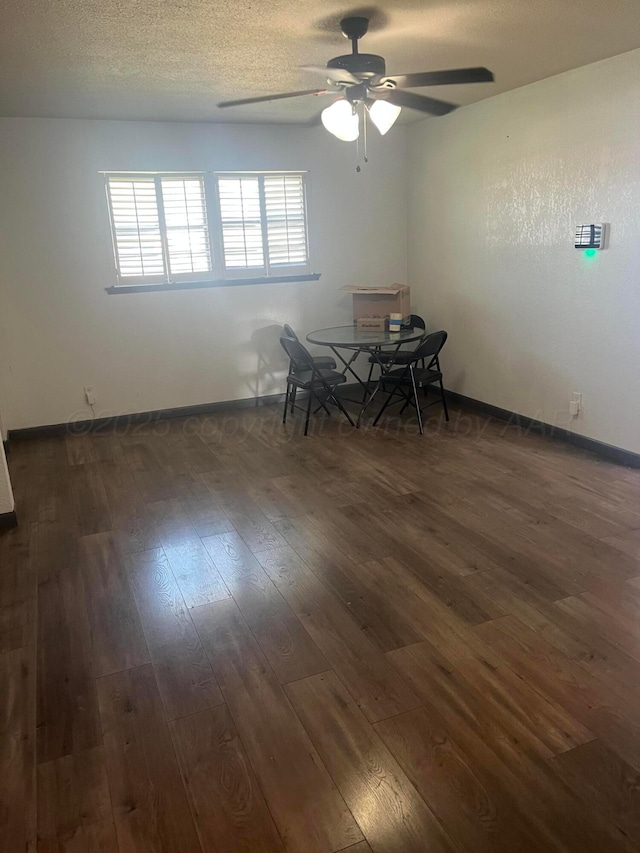 605 Star St, Hereford, TX 79045 - dining area featuring dark wood-type flooring and a ceiling fan
