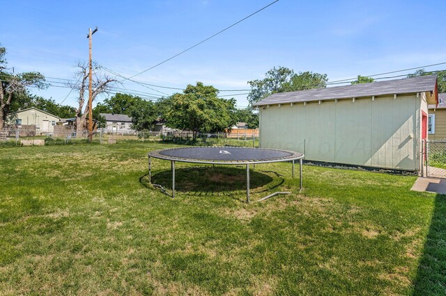4114 S Hayden St, Amarillo, TX 79119 - view of yard with a trampoline