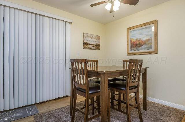 3406 Patterson Dr, Amarillo, TX 79109 - dining room with ceiling fan and baseboards