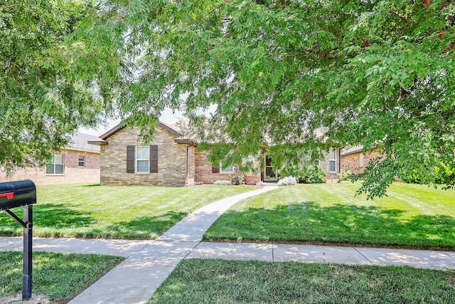 6501 Nancy Ellen St, Amarillo, TX 79119 - view of property hidden behind natural elements with a front lawn and brick siding