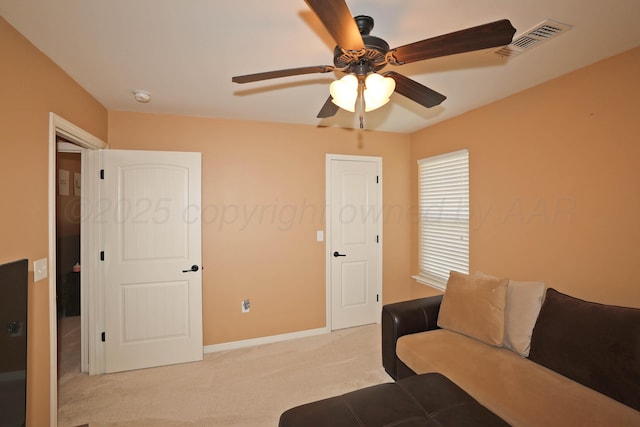 6501 Nancy Ellen St, Amarillo, TX 79119 - living area with light carpet and ceiling fan