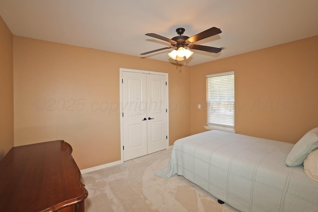 6501 Nancy Ellen St, Amarillo, TX 79119 - bedroom featuring carpet floors, a closet, and a ceiling fan