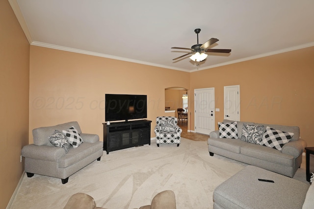 6501 Nancy Ellen St, Amarillo, TX 79119 - living area featuring ornamental molding, arched walkways, ceiling fan, and carpet