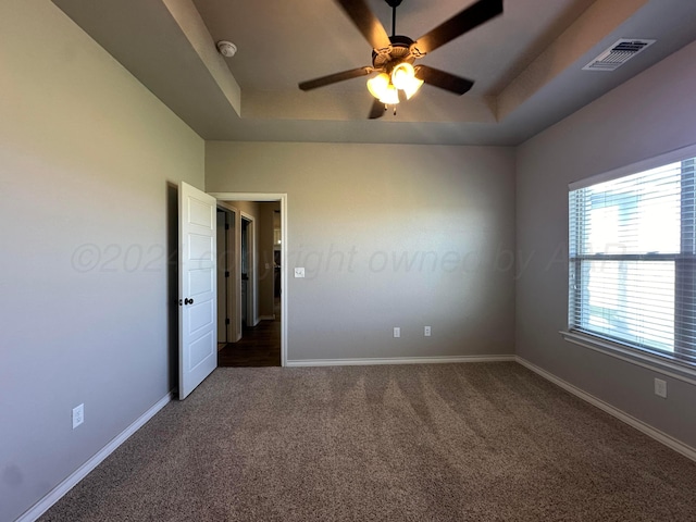 17901 19th St, Amarillo, TX 79124 - unfurnished room featuring a ceiling fan, dark carpet, a tray ceiling, a smoke detector, and baseboards