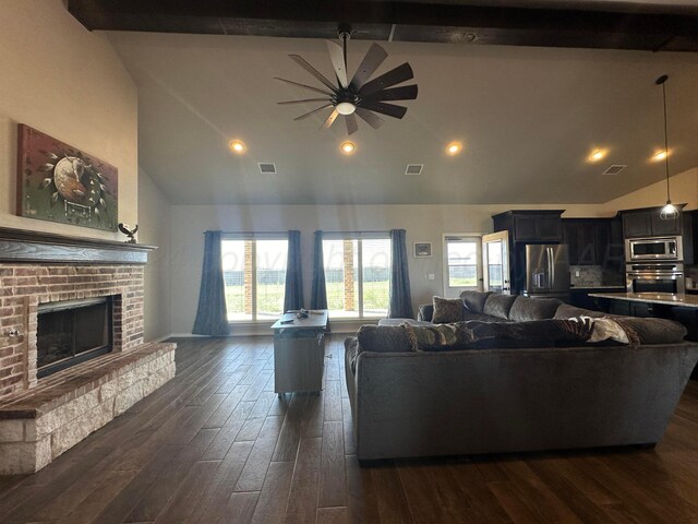 17901 19th St, Amarillo, TX 79124 - living room featuring ceiling fan, beam ceiling, a brick fireplace, dark wood-style flooring, and high vaulted ceiling