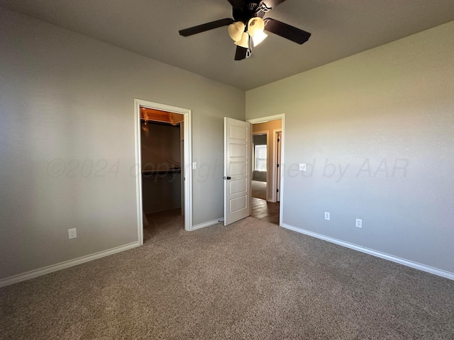 17901 19th St, Amarillo, TX 79124 - unfurnished bedroom with carpet floors, baseboards, a spacious closet, a closet, and ceiling fan