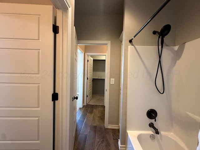 17901 19th St, Amarillo, TX 79124 - full bathroom featuring wood finished floors,  shower combination, and baseboards