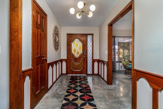 entrance foyer with a notable chandelier