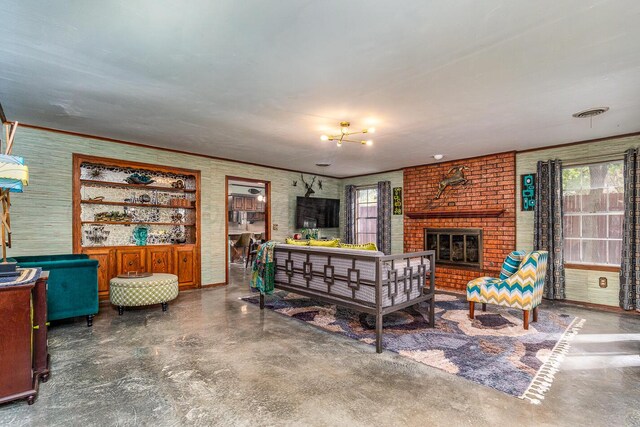 living room with a brick fireplace and a healthy amount of sunlight