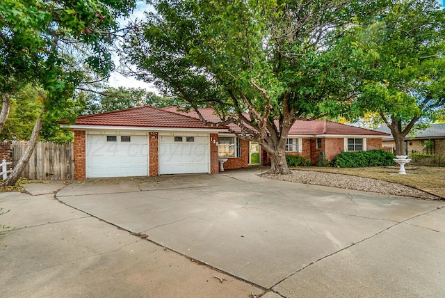 single story home with a garage